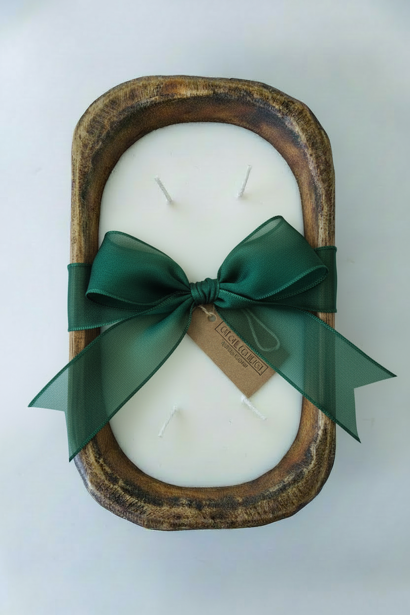 Brown dough bowl with forest-green Christmas bow